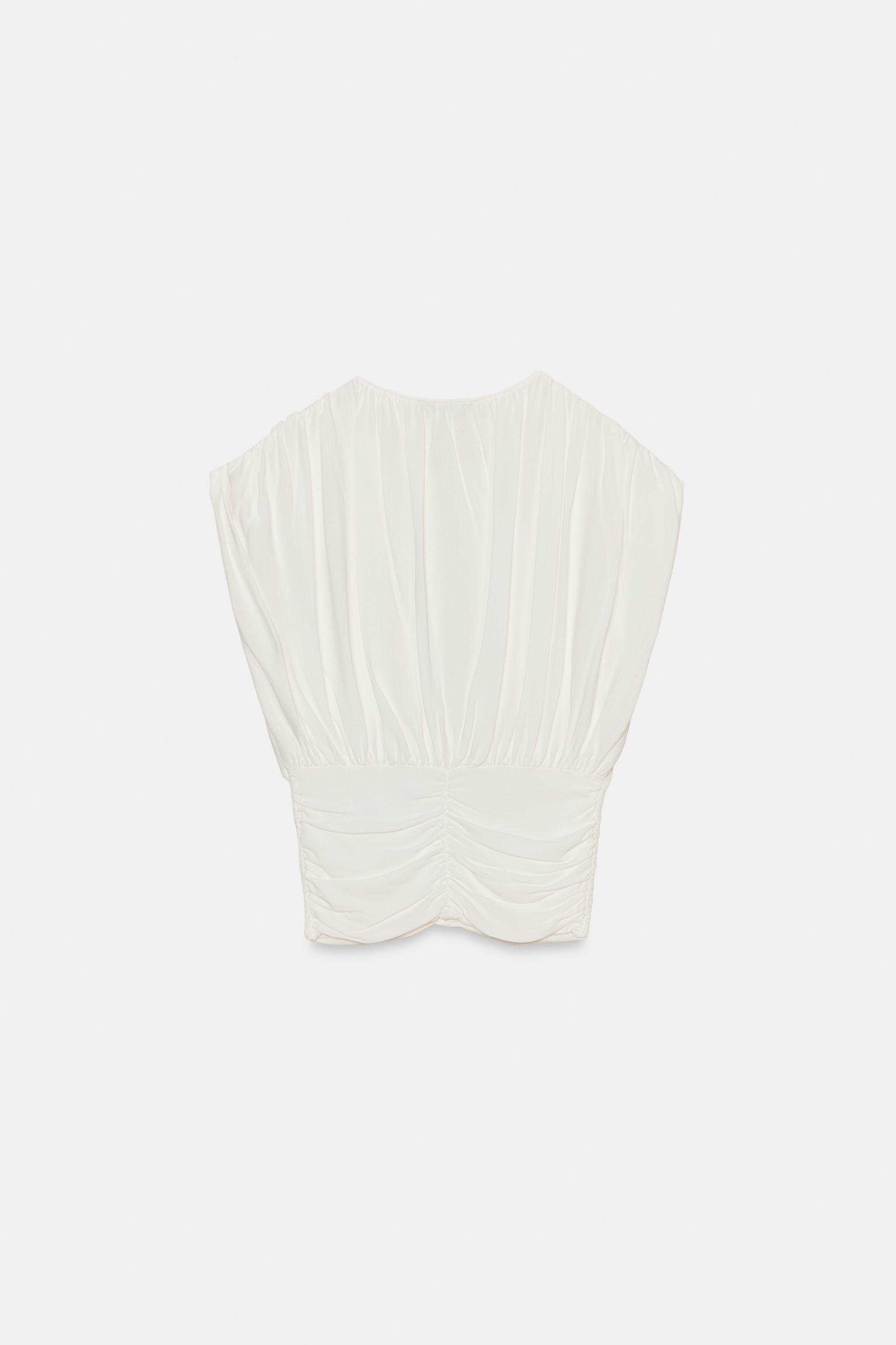 TOP DRAPÉ EN MAILLE